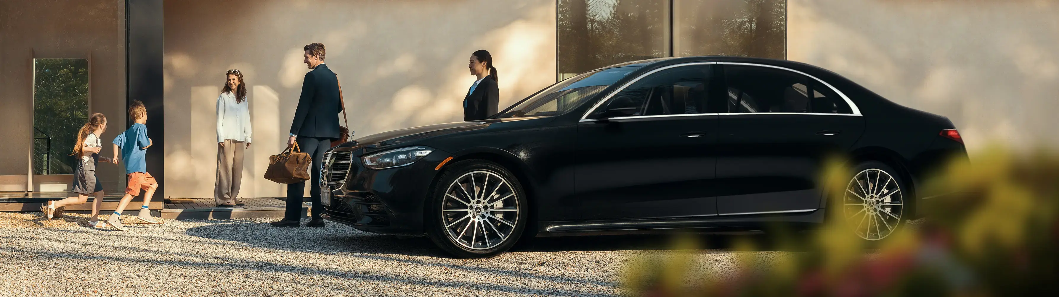 Professional chauffeur service with luxury vehicle